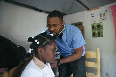 nurse treating a student at Rodaille school
